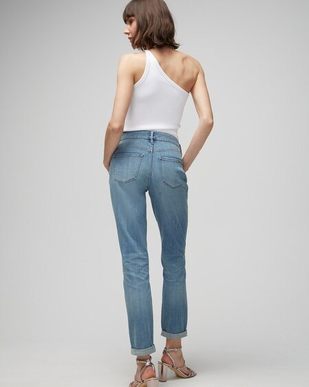 Shop White House Black Market Petite Mid-rise Destructed Girlfriend Jeans In Medium Wash Denim