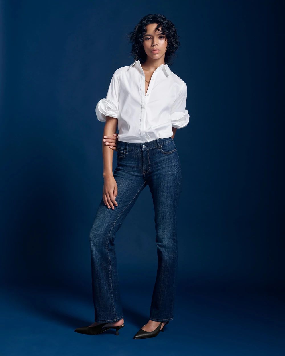 Petite Mid-Rise Bootcut Jeans click to view larger image.