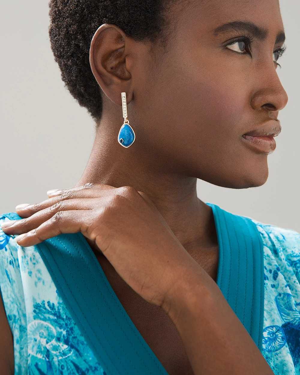 White house top black market earrings