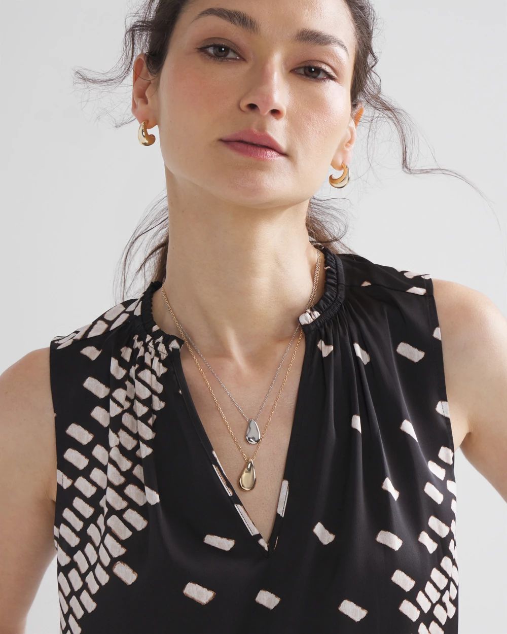 Sleeveless Ruched V-Neck Shell Top click to view larger image.