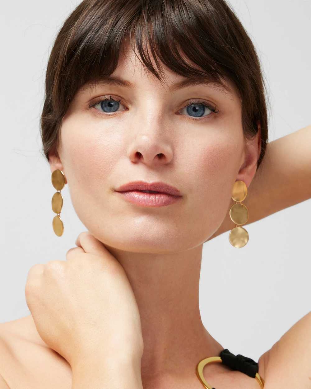 Goldtone Wavy Disc Linear Earrings click to view larger image.