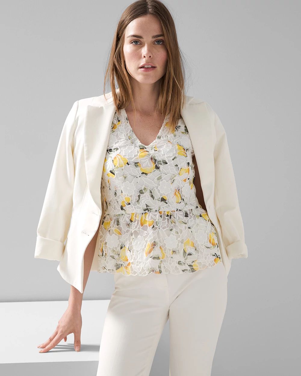 Sleeveless Lace Peplum Top