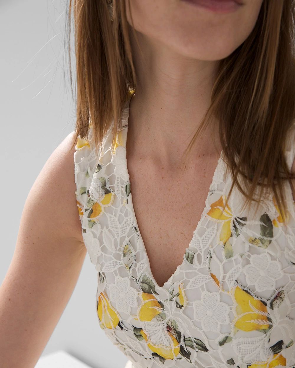 Sleeveless Lace Peplum Top