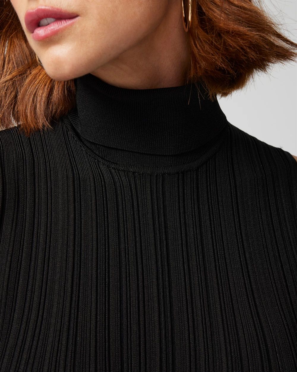 Varigated Rib Sleeveless Peplum Sweater