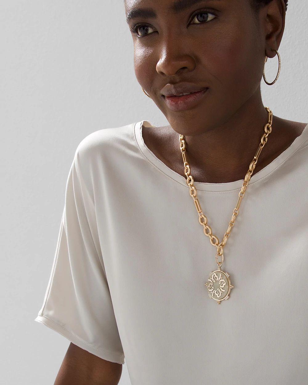 Goldtone Compass & Logo Necklace