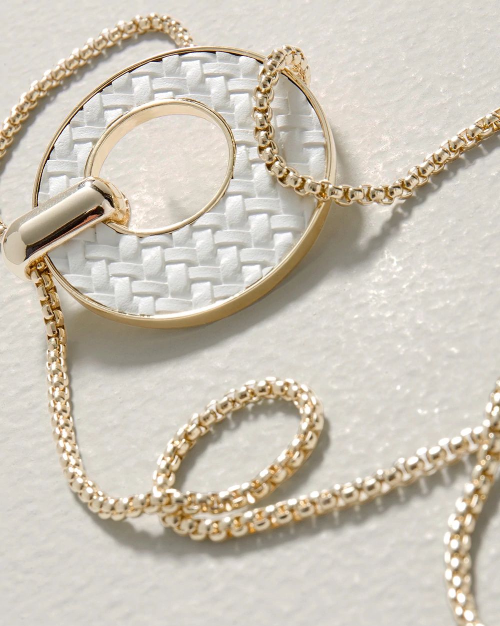White & Goldtone Leather Pendant Necklace click to view larger image.