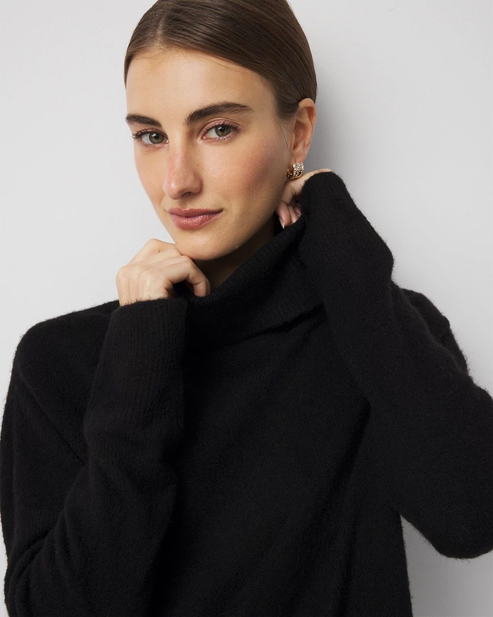 Asymmetrical Hem Turtleneck Sweater click to view larger image.