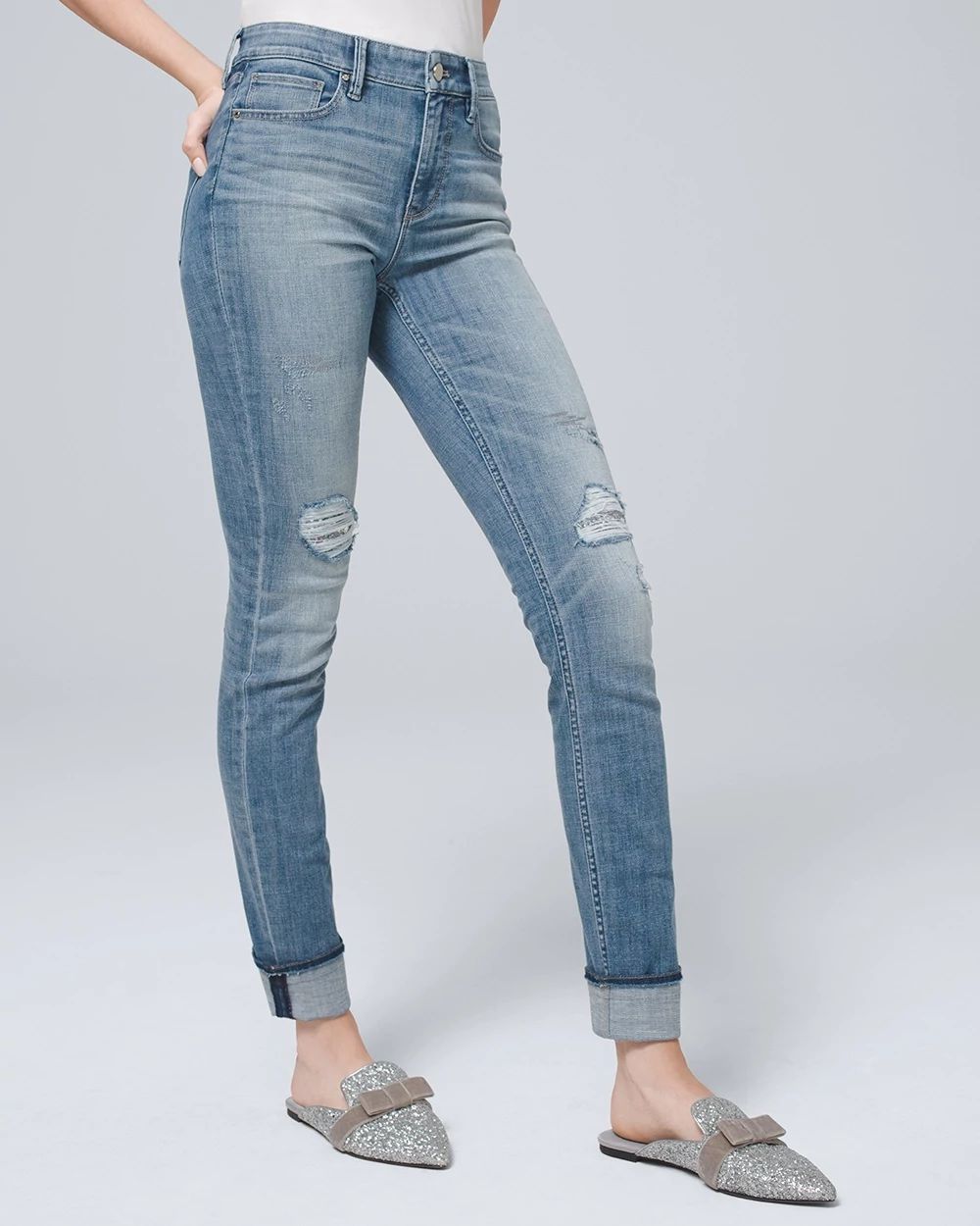 HIGH-RISE DESTRUCTED SLIM JEANS