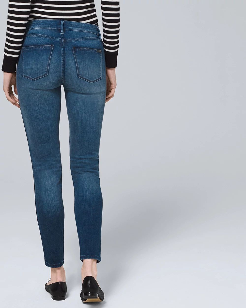 Mid-Rise Skinny Ankle Jeans with Faux Leather Trim click to view larger image.